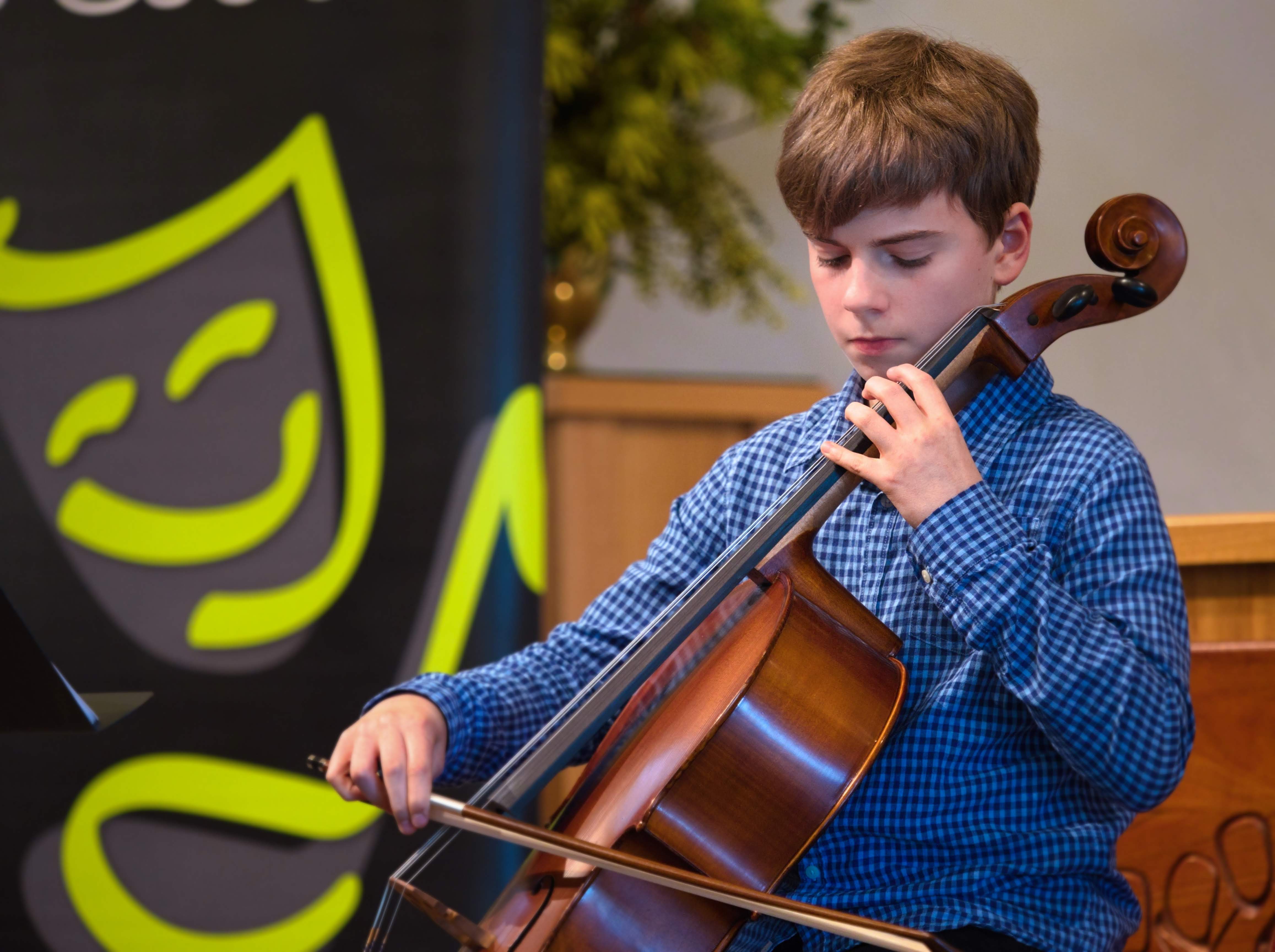 WGE Instrumental Mac O'Connor Displays His Skill on the Cello